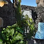 Lavastein-bauernhaus Yazmina Mit Schoenem Garten By Interhome