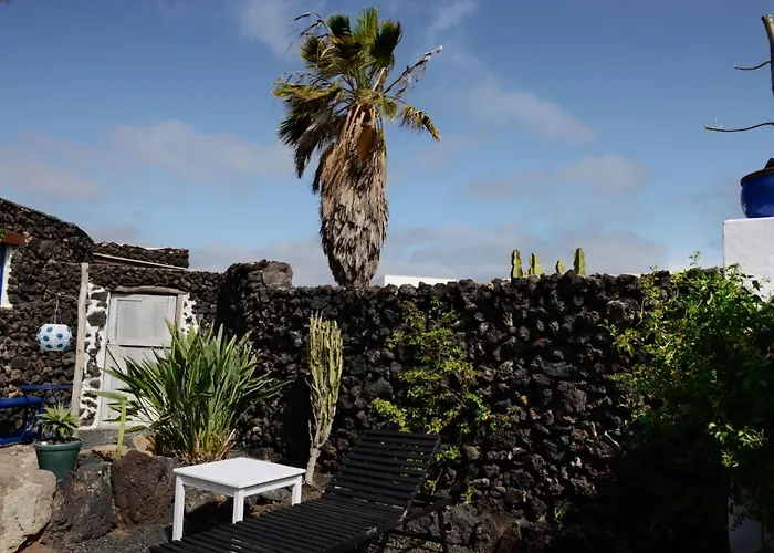 Lavastein-bauernhaus Yazmina Mit Schoenem Garten By Interhome